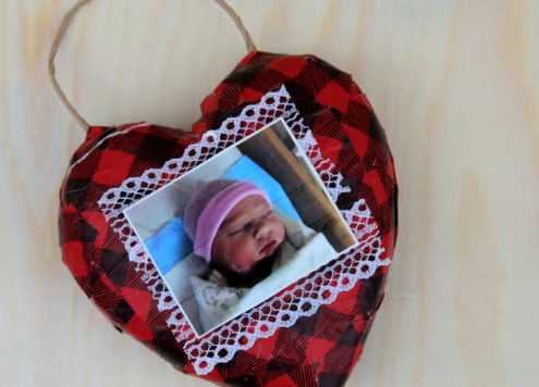 Recycled Gift Wrapping turns into this cute photo heart ornament! Easy craft