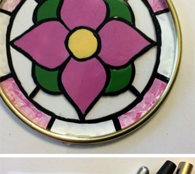 Faux Stained Glass Suncatcher - Use clear plastic containers to create faux stained glass suncatchers! They are as easy to make as they are pretty to look at.