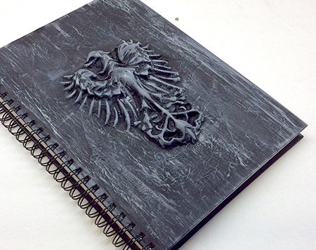 Can you guess the secret ingredient that I used to make this custom 3D notebook for my son?