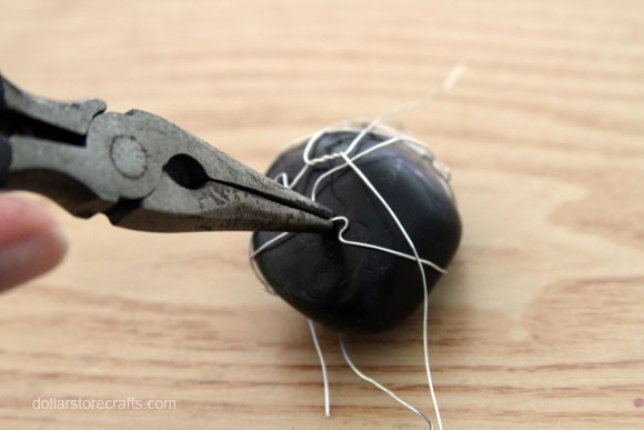 tightening the wire on the rocks