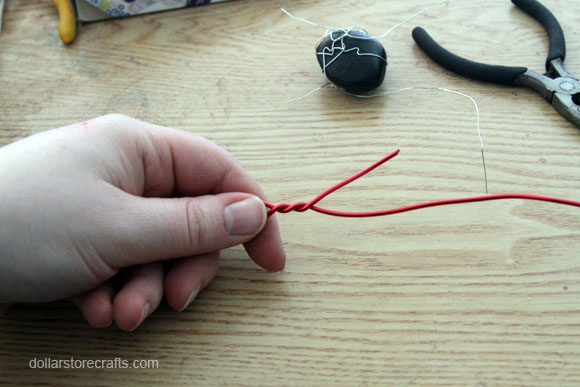 Twist the thicker wire