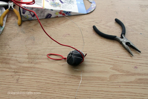 wrapping wire around rock