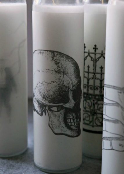 Make spooky candles with dollar store candles