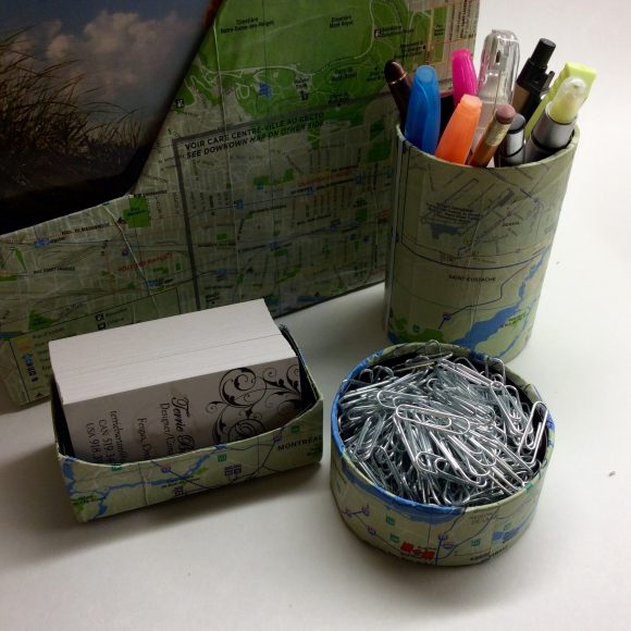 DIY Map Desk Set - Could your desk use a little help in the organization department? Make yourself a set of organizers using an assortment of items from the recycling bin! I covered mine with free maps I got while on vacation. You can use newspaper, magazine/book pages, scrapbook paper, wallpaper, music sheets, wrapping paper, or anything else you want to decorate yours!