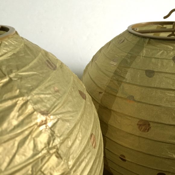 You only need two supplies to make these sweet gold-on-gold paper lanterns for between $1 and $3!