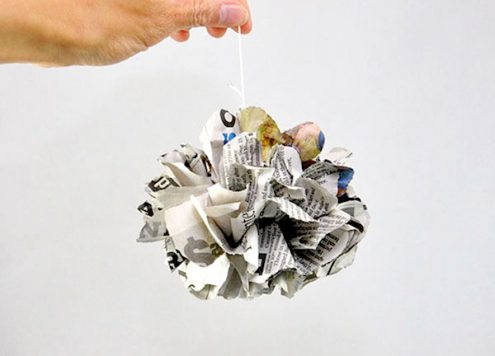 Make Newspaper Pom Poms