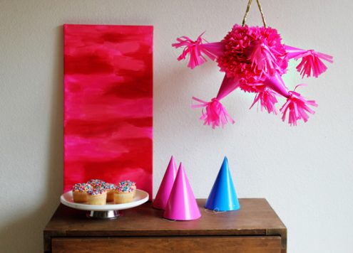 Make a party hat pinata (via dollarstorecrafts.com)
