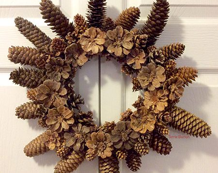 If you have access to pine cones and you own a hot glue gun, you can make this beautiful pine cone wreath for next to nothing.