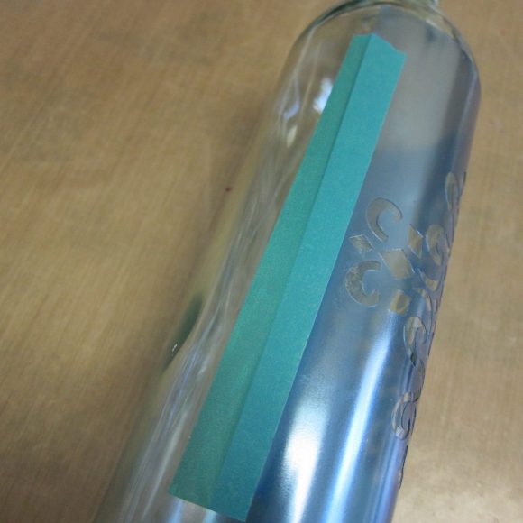 Make a Faux Sea Glass Bottle - Sea glass is still so popular, and it's a beautiful way to decorate your home in the summer.  Rather than buying new decorative accents, you can make your own using a few simple items plus recyclables.  