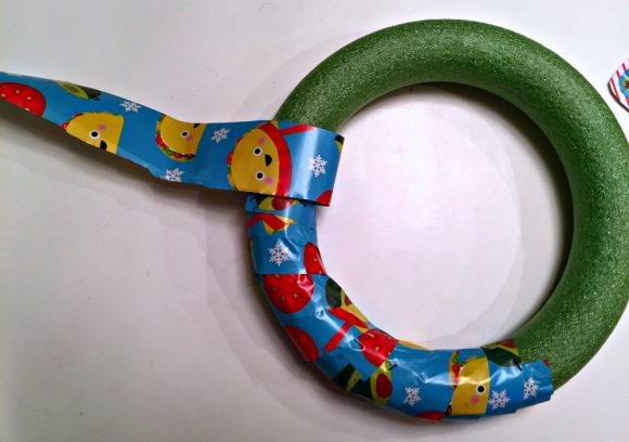 Make a Recycled Gift Wrap Wreath - Dollar Store Crafts