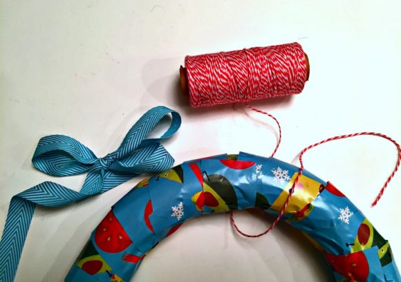 Recycled Gift Wrap wreath craft idea - Dollar Store Crafts