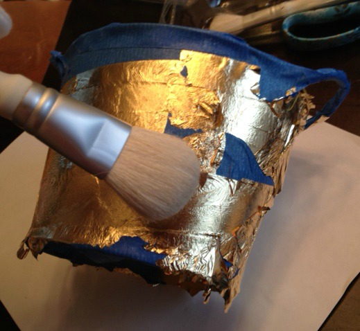 Burnishing gold leaf
